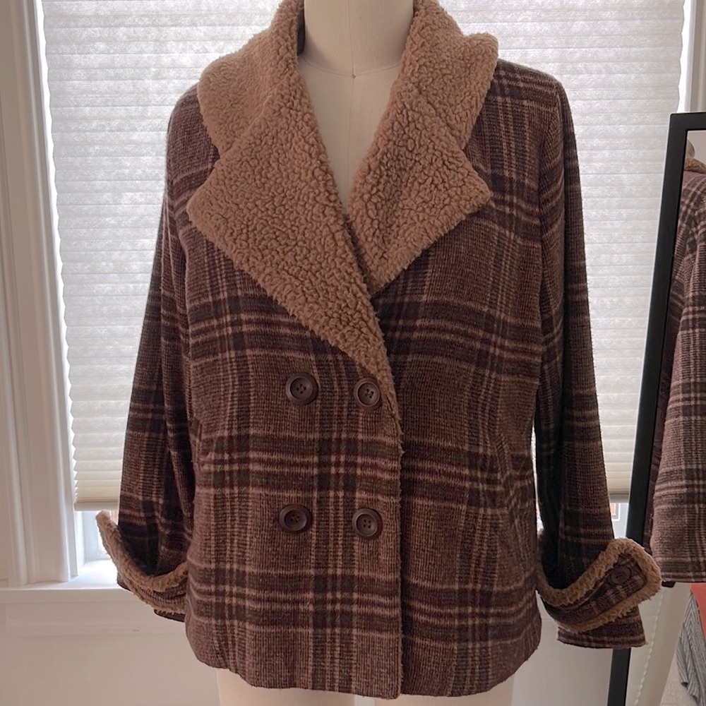Plaid shearling jacket with pockets, no hood. Great condition.
